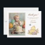 Classic Pooh and Piglet First Birthday Thank You Card<br><div class="desc">Express your gratitude with this charming Winnie the Pooh-themed thank you card. The front of the card features a rustic, sketch-style illustration of Pooh and his best friend, Piglet, sitting in a field of flowers. A space is provided to showcase a cherished photo, along with a personalized message of thanks....</div>