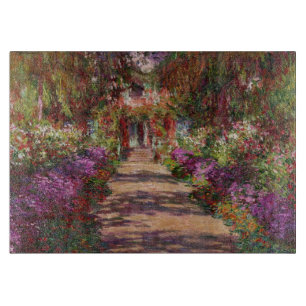 Claude Monet A Pathway in Monet's Garden Cutting Board