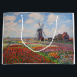 Claude Monet - Field of Tulips in Holland Large Gift Bag<br><div class="desc">Field of Tulips in Holland (Champs de tulipes en Hollande) - Claude Monet,  Oil on Canvas,  1886</div>