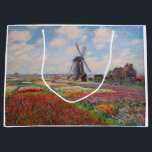 Claude Monet - Field of Tulips in Holland Large Gift Bag<br><div class="desc">Field of Tulips in Holland (Champs de tulipes en Hollande) - Claude Monet,  Oil on Canvas,  1886</div>