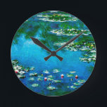 Claude Monet-Water-Lilies Round Clock<br><div class="desc">Water-Lilies made in 1906,  is one of Claude Monet’s most famous paintings.An elegant round wall clock with intensities of blue, green and yellow for Impressionism lovers and everyone who appreciates real fine art.</div>