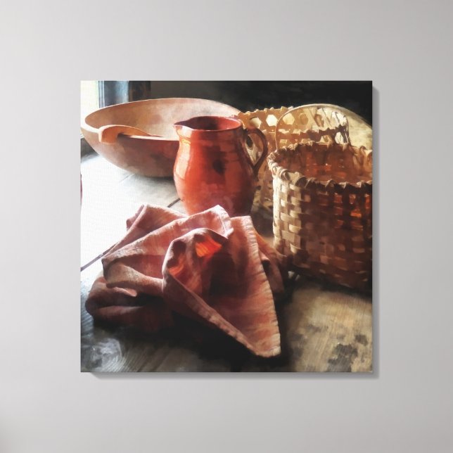 Clay Pitchers Bowl And Baskets Canvas Print (Front)