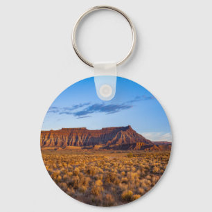 clear blue sky covers gorgeous brown hill keychain