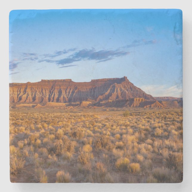clear blue sky covers gorgeous brown hill stone coaster (Front)