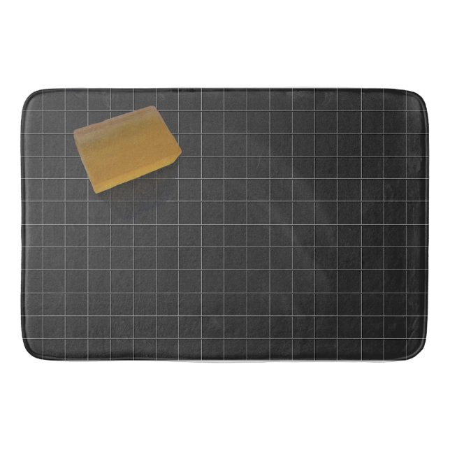 Clear Orange Soap on a Black Tile Floor Bath Mat (Front)