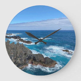 Clock rocks in the sea