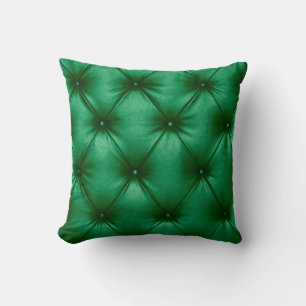 Close up background texture of dark green capitone throw pillow