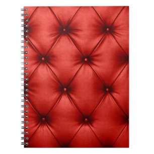 Close up background texture of scarlet red capiton notebook
