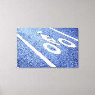 Close-up of a bicycle sign on the road