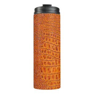 Close up of a brown reptile vintage leather textur thermal tumbler