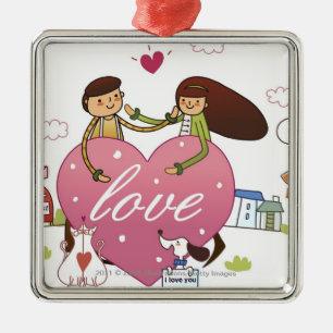 Close-up of a couple holding a heart shape metal ornament