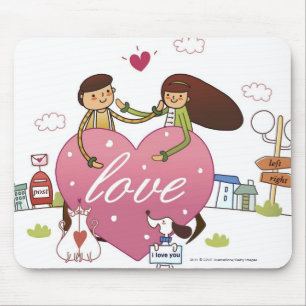 Close-up of a couple holding a heart shape mouse pad