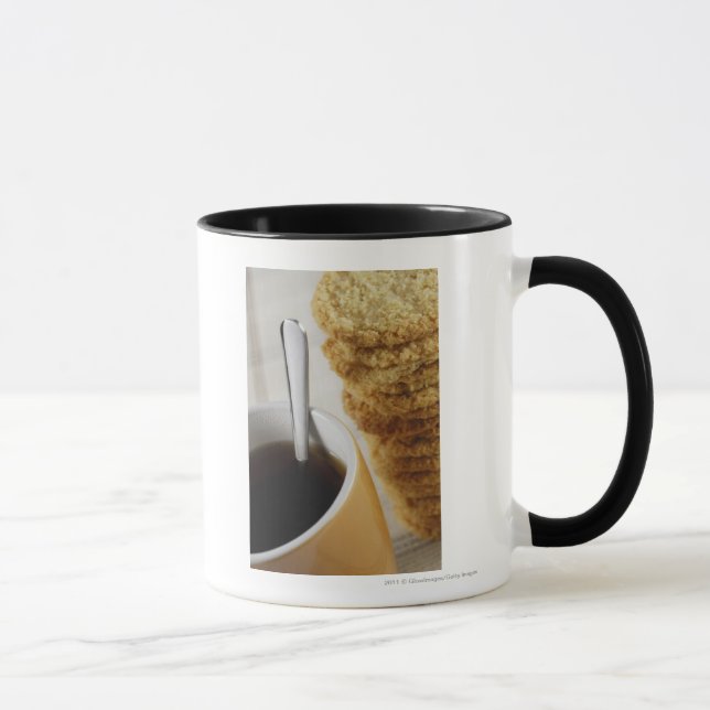 Close-up of a cup of coffee with cookies (Right)