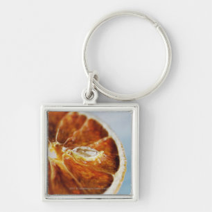 Close-up of a dried slice of lemon keychain