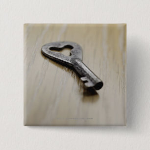 Close-up of a key 2 inch square button
