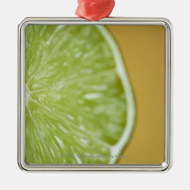 Close-up of a lemon slice metal ornament (Front)