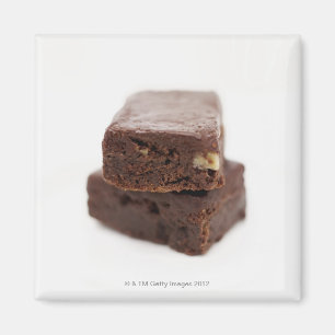 Close-up of a pile of two chocolate brownies on magnet