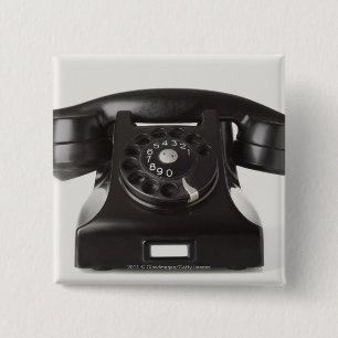 Close-up of a rotary phone 2 inch square button