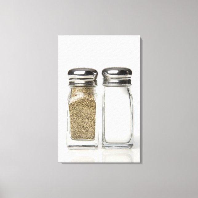 Close-up of a salt and a pepper shaker 2 canvas print (Front)