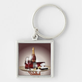 Close-up of a waiter's hand holding a tray keychain