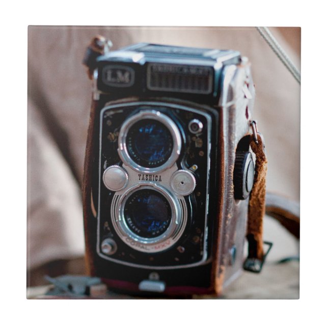 Close-up of an antique camera tile (Front)