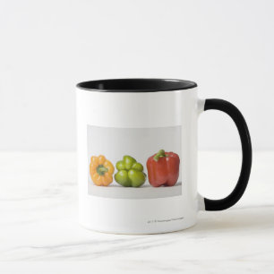 Close-up of bell peppers in a row mug