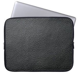 Close up of black leather texture and backgroundle laptop sleeve