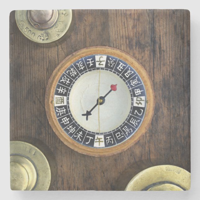 Close Up Of Chinese Compass And Gold Weights Stone Coaster (Front)