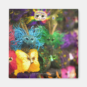 Close-up of colourful miniature masks magnet