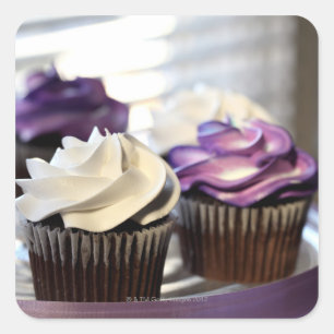 Close-up of cupcakes with selective focus on square sticker