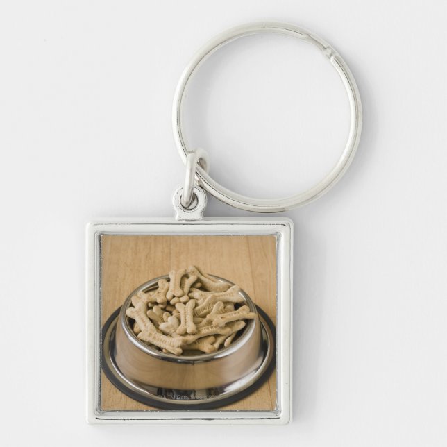 Close-up of dog biscuits in a dog bowl keychain (Front)