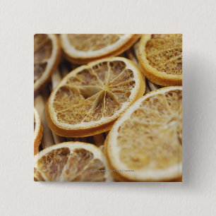 Close-up of dried slices of lemon 2 inch square button
