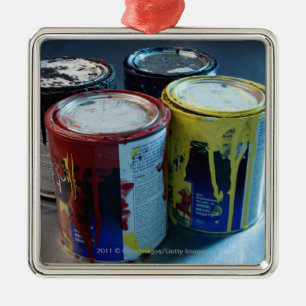 Close-up of four paint cans metal ornament