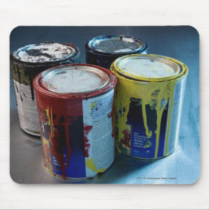 Close-up of four paint cans mouse pad