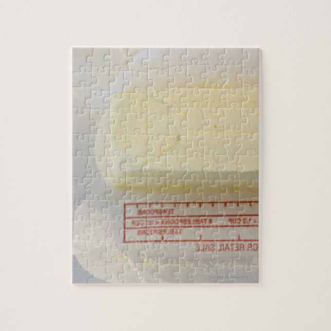 Close-up of fresh butter jigsaw puzzle (Vertical)