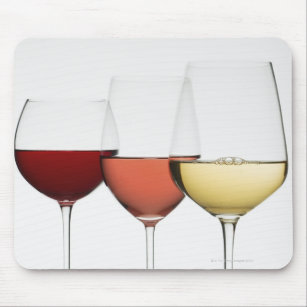 Close up of glasses of different wines mouse pad