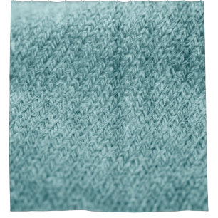 Close up of green knitted textured background.