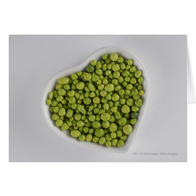 Close-up of green pebbles in a heart shape bowl (Front Horizontal)