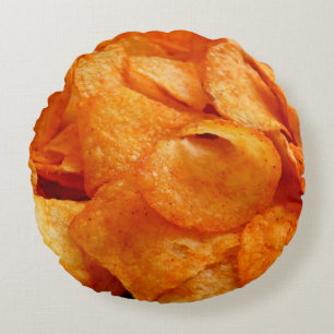 Close up of juicy, crispy, chips on black plate. round pillow