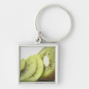 Close-up of kiwi slices keychain
