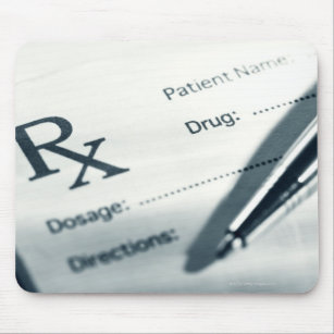 Close up of prescription pad and pen mouse pad