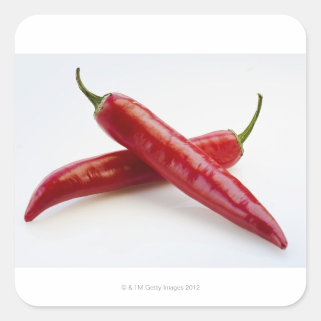 Close up of red chili peppers on white square sticker (Front)