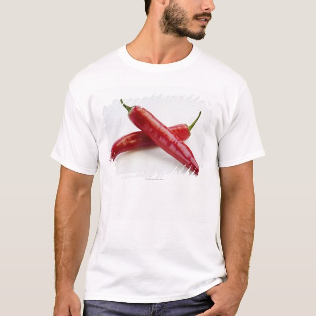 Close up of red chili peppers on white T-Shirt (Front)