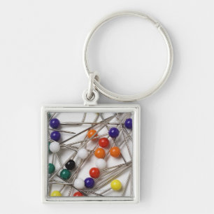 Close-up of straight pins keychain