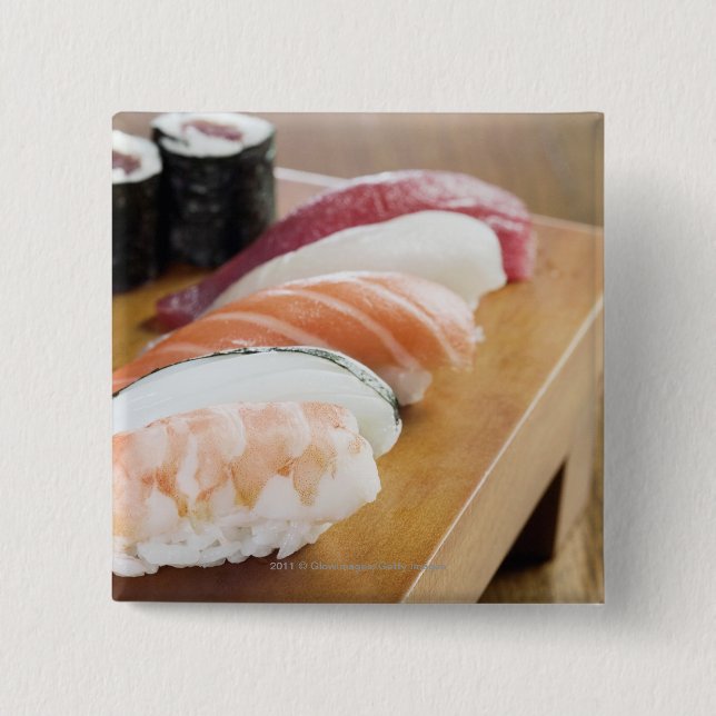 Close-up of sushi on a table 2 inch square button (Front)