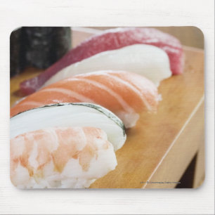 Close-up of sushi on a table mouse pad
