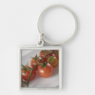 Close-up of tomatoes on a tray keychain