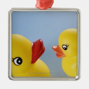 Close-up of two rubber ducks metal ornament
