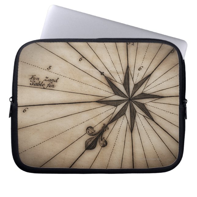 Close up of wind rose on antique map laptop sleeve (Front)