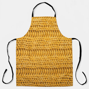 Close up of yellow knitted textured background. Tr Apron